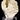 Vault Piece 113: The Imperial Summit layered white calcite with gold pyrite frosting, mounted on a clear crystal base.
