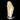 Vault Piece 113: Monumental layered beige calcite with pyrite frosting, mounted on a clear display stand.